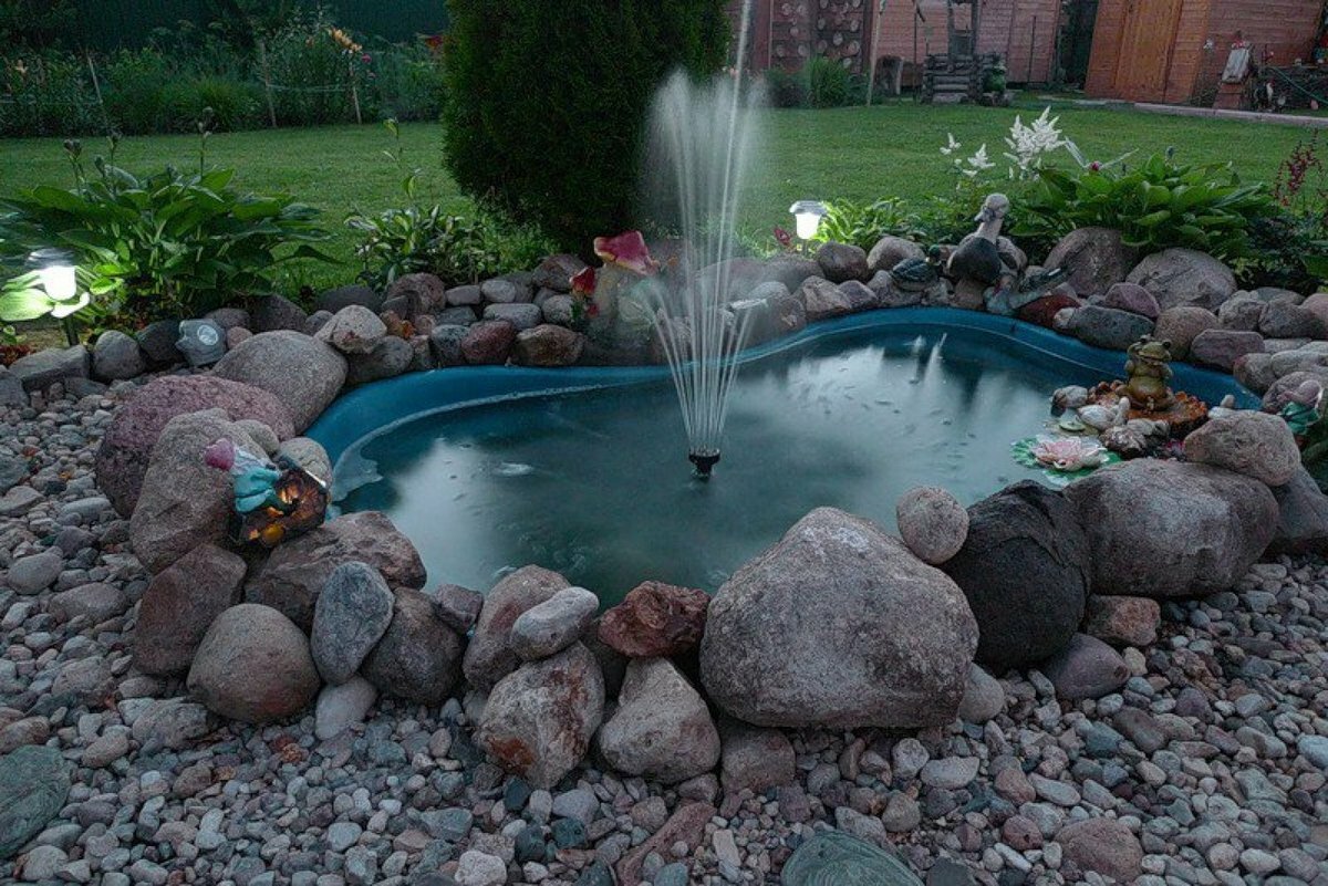 Discover Tranquility: Bespoke Garden Ponds by Sporendipity